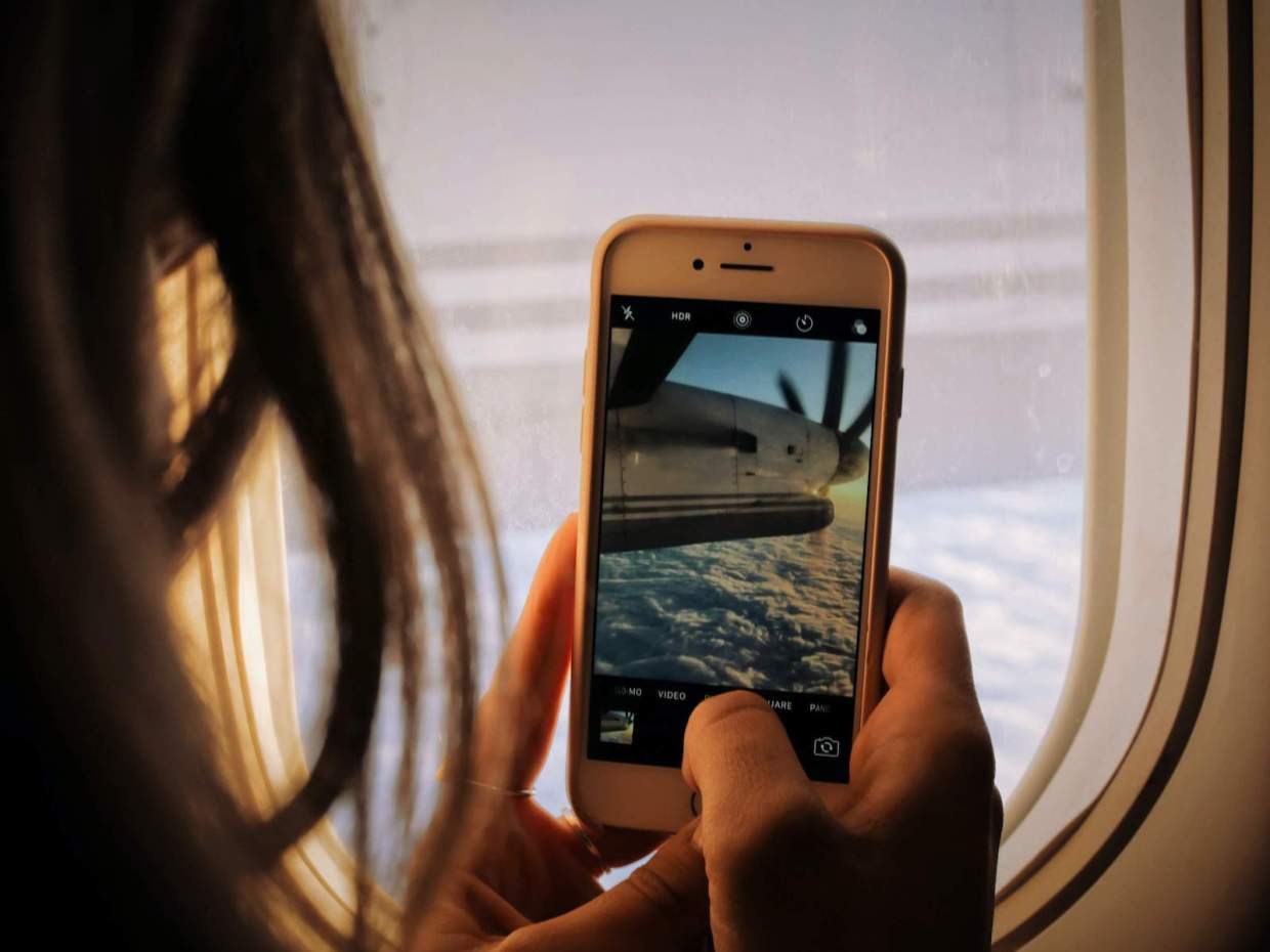 Phone and Plane Window 1